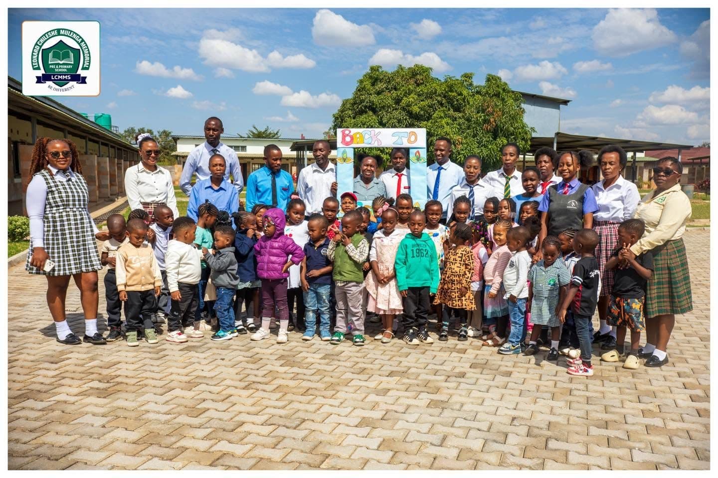 Teachers and pupils gathered for a group photo on Back To School day