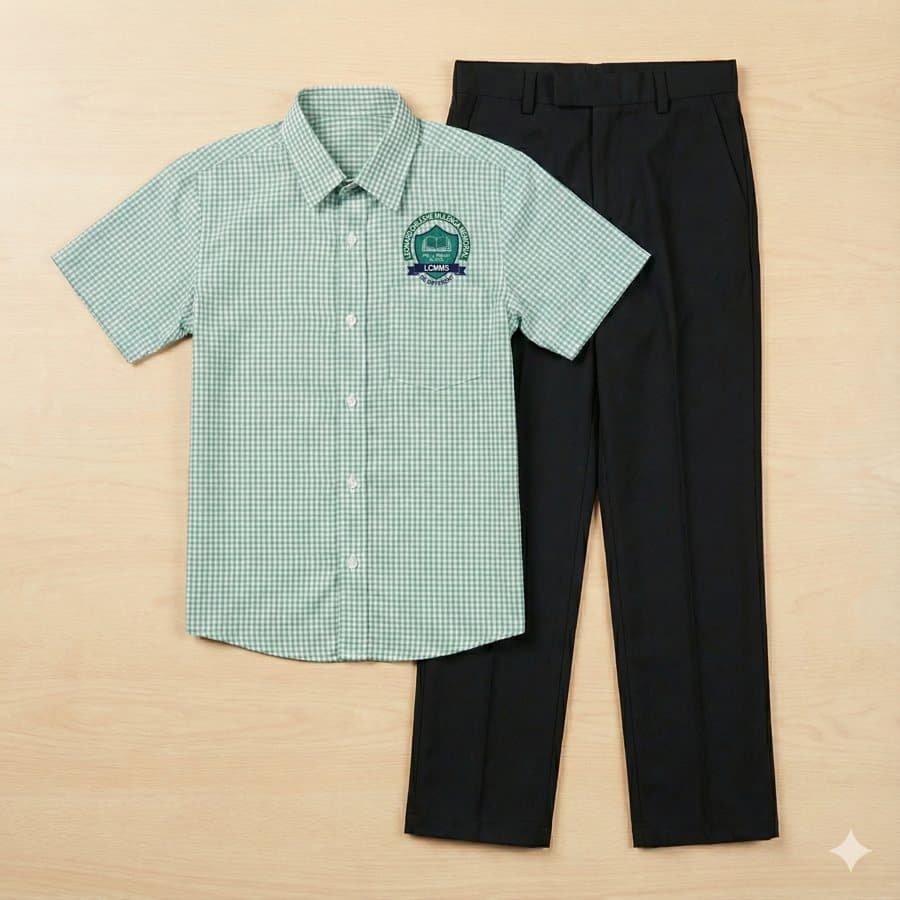 Green checked shirt with the school crest and black trousers